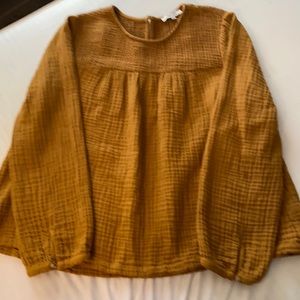 Madewell women’s long sleeve blouse.